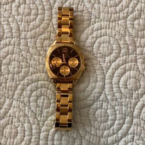 Gold coach watch